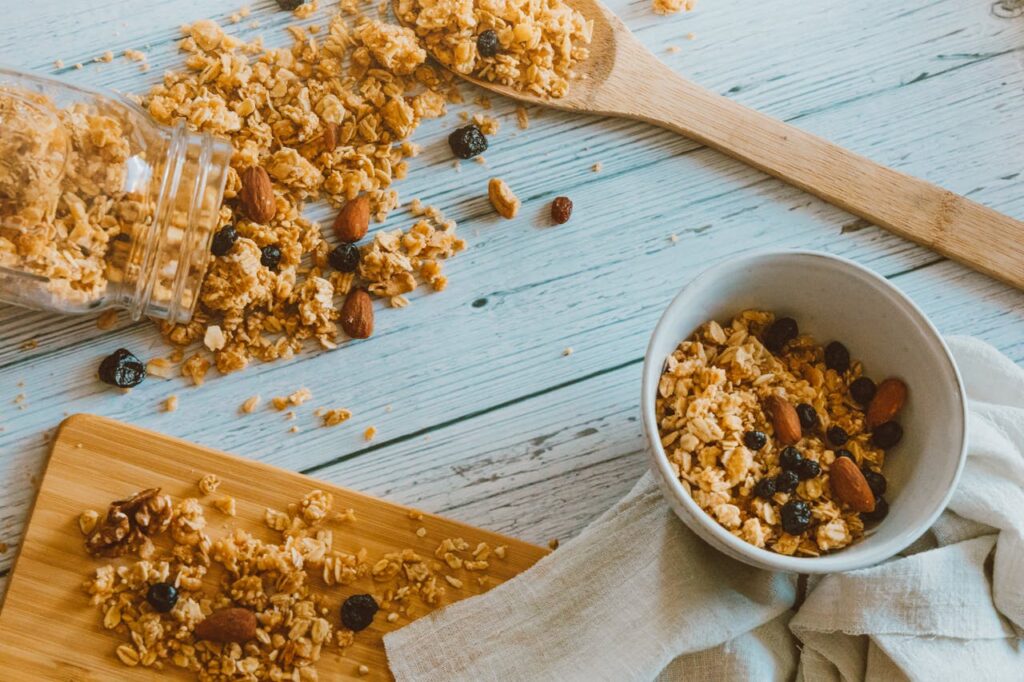 Dehydrate almond pulp to make granola