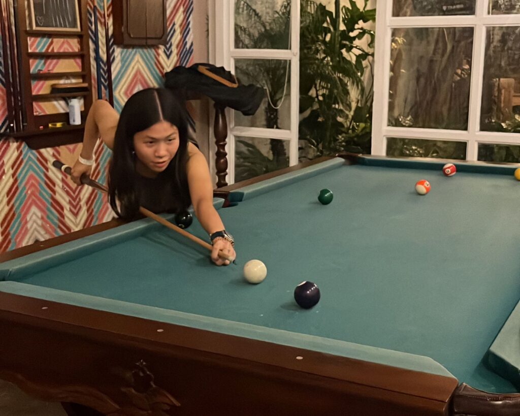 Ally Playing Pool at Maya Papaya