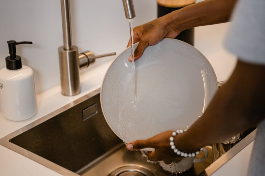 rinsing dishes